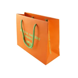 Custom Logo Portable Low Cost kids jacket Gift Shopping Bag Garment Paper Bag With Handles