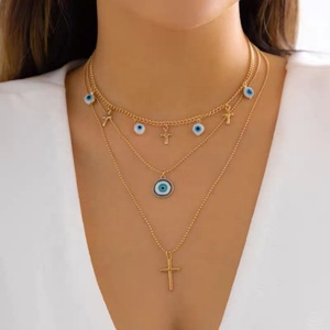 Collar con Colgante de Acero Inoxidable Chapado en Oro de 18K con Diseño de Ojos Azules en Forma de Cruz de Tres Capas Estilo Bohemia Vintage, Regalo Unisex - Product Image 1