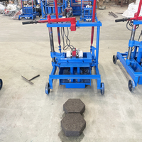 Vente chaude en Afrique : Petite machine à fabriquer des briques mobile 2-45 monophasée, abordable, facile à utiliser, adaptée à un usage domestique.