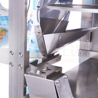 Petite machine d'emballage multifonctionnelle verticale automatique CE pour le scellement arrière de céréales haricots sésame ou le scellement à trois côtés