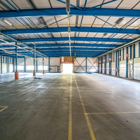 Hangar en acier préfabriqué certifié CE, sortie directe d'usine avec option système de grue et montage facile