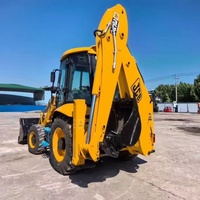Chargeuse-pelleteuse d'occasion JCB 3CX originale du Royaume-Uni, populaire pour les travaux de terrassement et la réparation routière