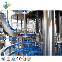 Équipement compact monobloc de remplissage, bouchage et étiquetage en acier inoxydable de 5 litres pour usine d'eau minérale