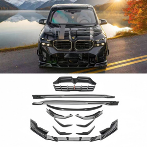 ชุดแต่งคาร์บอนไฟเบอร์แห้งสีดำคาร์บอน รุ่น XM G09 แบบใหม่ อัพเกรดสไตล์ AE  ประกอบด้วยลิ้นกันชนหน้า  ดิฟฟิวเซอร์ สปอยเลอร์  กระโปรงข้าง  แบบยึดติดด้วยสกรู - Product Image 1