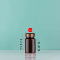 Bouteilles de distribution de Maca PET brun haut de gamme Capsule tablette bouchon à vis pompe Stock pour produits de santé bonbons à l'huile de poisson en gros