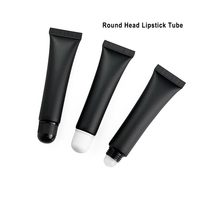 Tube de crème en plastique noir givré avec tube de crème pour les yeux à rouleau avec bouchon en métal argenté Logo personnalisé en or Conteneurs de brillant à lèvres vides