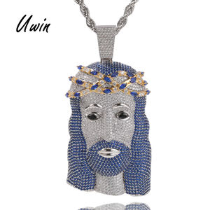 Colgante de Jesús Gigante UWIN Hip Hop, Completamente Cubierto de Piedras Preciosas, con Corona Bicolor y Circonitas Azules - Product Image 1