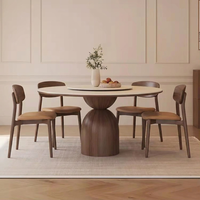 Table à manger en bois massif de style rétro français avec quatre chaises, combinaison haut de gamme, table ronde simple pour appartement ou villa
