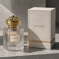 Couvercle de flacon de parfum sur pied durable avec couronne en pierre précieuse verte pour collections d'eaux de parfum de luxe sur mesure