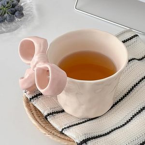 Mignonne tasse en céramique pour lait, réutilisable, avec poignée en forme de nœud, compatible lave-vaisselle et micro-ondes, pour le bureau, la maison, le café - Product Image 4