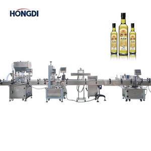 เครื่องบรรจุอัตโนมัติ HONGDI พร้อมระบบติดฉลาก สำหรับน้ำอัดลม นม ไวน์ เบียร์ ควบคุมด้วยหน้าจอสัมผัส PLC แรงดันไฟฟ้า 380V/220V ความเร็ว 6000 ขวดต่อชั่วโมง - Product Image 2