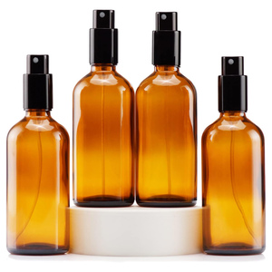 Botellas de Perfume Redondas de Vidrio Ámbar Oscuro de 30 ml, 50 ml y 100 ml con Pulverizador y Serigrafía - Product Image 1