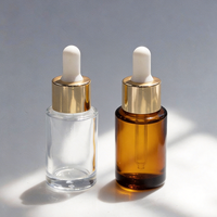 Flacon compte-gouttes rond en verre ambré personnalisé OEM avec pipette graduée pour huile essentielle, sérum, huile capillaire, huile à barbe 10ml 15ml 20ml