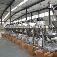 Ensacheuse de ciment de dosage automatique 10-50kg pesant et cousant la machine à emballer de bouche ouverte de poudre d'emballeur