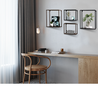 Modernes dekoratives Set von 4 Black Metal Square Frame Shadow Boxes Würfel schwimmende Regale