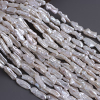 Perles de culture d'eau douce Biwa 8-9x23-25mm baroques blanches percées sur le long, brin de 40cm pour boucles d'oreilles et pendentifs