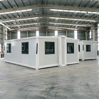 Maison conteneur modulaire portable et mobile de 40 pieds à double aile, résistante aux intempéries, à montage rapide, avec cuisine et salle de bain