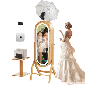 2025 Magic Mirror <span class=keywords><strong>Photo</strong></span> <span class=keywords><strong>Booth</strong></span> Machine <span class=keywords><strong>mac</strong></span> Ios System Miroir en bois 21.5 pouces LCD Écran tactile Photomaton - Product Image 1
