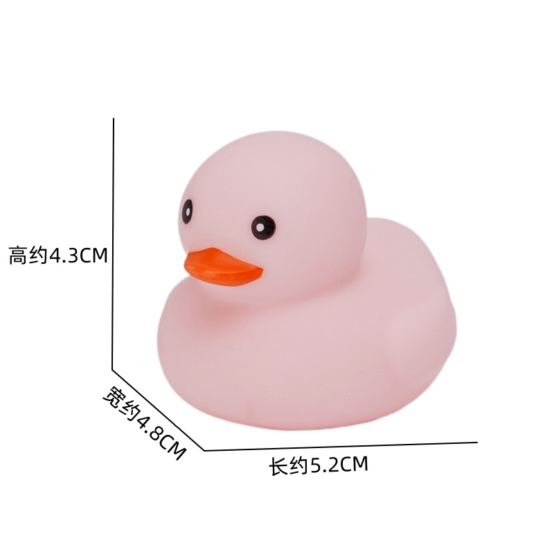 Un macaron rosa claro con forma de pato número 8.