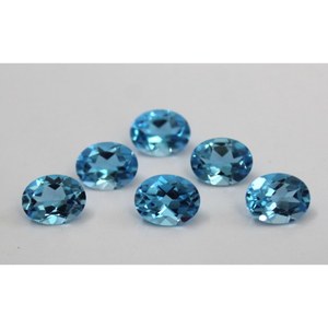 พลอยบลูโทปาซธรรมชาติ ขนาด 9*11 มม. น้ำหนัก 4.5 กะรัต รูปทรงวงรี มีรอยแตก เหมาะสำหรับทำเครื่องประดับ - Product Image 1