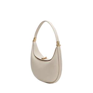 Light <b>green</b> leather crescent-shaped handbag with luxurious metal embellishments, a women's shoulder <b>bag</b>. - Product Image 1