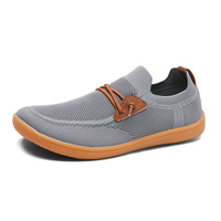 Mocassins pour hommes en maille tricotée respirante, à enfiler, avec lacets décoratifs en cuir, semelle en caoutchouc antidérapante, pour la conduite, la marche quotidienne et les loisirs, style bateau