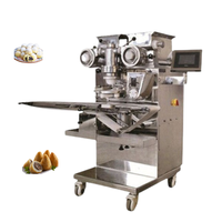 Machine de remplissage de pâte commerciale pour l'égyptien Aish Baladi avec fabricant de desserts farcis au pain sucré aux dattes