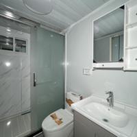 Maison conteneur pliable moderne en acier, 2 ou 3 chambres, préfabriquée, 20ft 30ft 40ft, avec salle de bain, panneau sandwich, pour entrepôt et salon