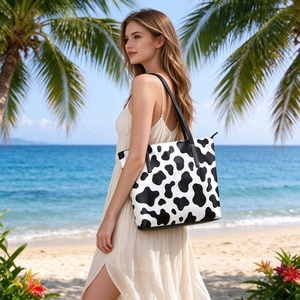 Wholesale Large Capacity Custom Cow Print PU Leather Tote <b>Bag</b> for <b>Women</b> Fashion Beach <b>Bags</b> with Zip Closure for Vacation - Product Image 1
