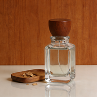 Flacon de parfum carré en verre de haute qualité 50ml 100ml avec bouchon en bois à épaule arrondie, conteneur de parfum vide pour logo cosmétique