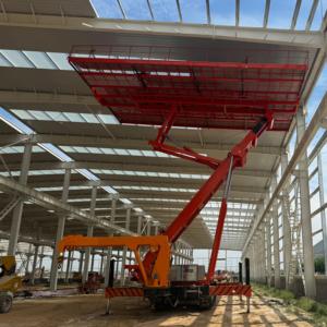 Plataforma elevadora hidráulica sobre orugas multiusos con elevación inversa para obras de construcción - Product Image 6