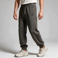 Pantaloni da jogging da uomo grigio oliva affusolati con polsini a costine, nastro laterale verticale, cintura con coulisse, tasche inclinate con occhielli