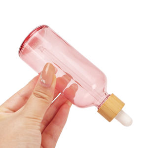 Venta al por Mayor de Botellas de Vidrio Rosa Vacías y Ecológicas de 5ml, 10ml, 15ml, 20ml, 30ml, 50ml y 100ml con Gotero y Tapa de Bambú para Aceites Esenciales - Product Image 5