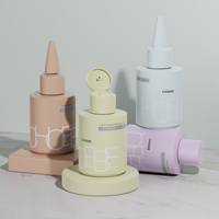 Bouteilles en plastique personnalisées de nouvelle conception, bouteilles vides pour huile capillaire, bouteilles à presser pour soins capillaires, applicateur à bec torsadé pour emballage de produits de soin de la peau