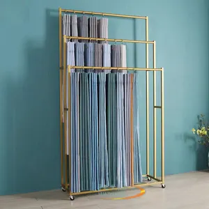 Wholesale gold triple layer metal curtain display shelves free standing cloth fabric display racks for shops