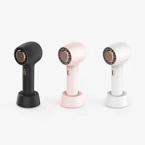 Yarı iletken soğutma plakası ile sıcak satış Mini Handy hava soğutma fanı moda saç kurutma makinesi şekli taşınabilir masaüstü vantilatör tabanı ile