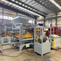 Machine à fabriquer des briques de pavage hydrauliques QT4-15 pour produits en béton
