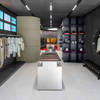 Nouvelle boutique Vitrine de vêtements Design personnalisé Table vitrine en acier inoxydable pour magasin de vêtements
