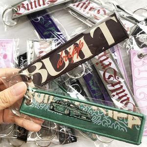 Personalizar logotipo personal tejido bordado llavero tela llavero etiqueta con diseño propio tejido bordado llaveros - Product Image 3