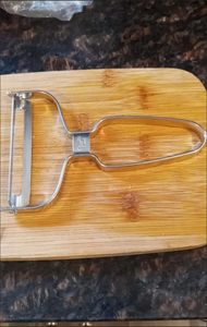 Многофункциональный кухонный гаджет из нержавеющей стали: поворотная овощечистка для фруктов, овощей, моркови и картофеля - Product Image 6