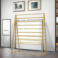 Nouveau style, fabricant sur mesure, présentoirs de sol modernes en fer et métal pour tissus, supports à tapis et présentoirs à foulards