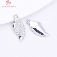 Vente en gros de pendentifs en laiton plaqué or champagne 24 carats de haute qualité, en forme d'ailes d'ange, tendance, pour la fabrication de bijoux DIY de haute qualité
