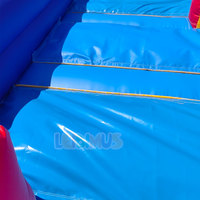 Grand toboggan gonflable à double voie multicolore pour enfants, idéal pour les anniversaires, les événements et les fêtes