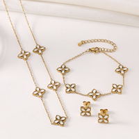 Bracelets de trèfle à quatre feuilles en acier inoxydable 18 carats de luxe en vente en gros Ensemble de bijoux pour femmes collier fleur en zircon boucle d'oreille