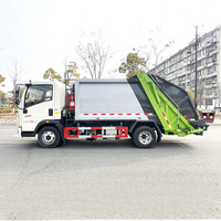 Camion compacteur de déchets hydraulique diesel manuel Sinotruk Howo 4x2, petit modèle 6 m³ à vendre