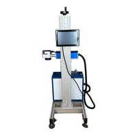 Machine de marquage laser à fibre 50W 60W 100W pour le codage de la date de production, graveur laser volant en ligne