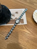 Arloji Baru Terlaris Platinum Brass Mewah Minimalis Oval Fashion Quartz Movement Dial Kecil Eksklusif dengan Tali Jam Tangan