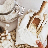 Sac de courses réutilisable en coton biologique beige avec cordon de serrage et logo personnalisable pour le stockage des aliments, riz et légumes