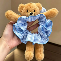 Bandeau pour cheveux en forme d'ours pour filles avec un design en peluche mignon. Un accessoire pour cheveux en queue de cheval longue. Un accessoire capillaire polyvalent
