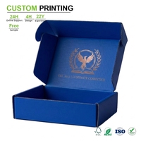 Boîtes d'expédition en carton ondulé bleu cobalt imprimées sur mesure avec logo en feuille d'or rose à l'intérieur du couvercle pour l'expédition en gros de marques de cosmétiques